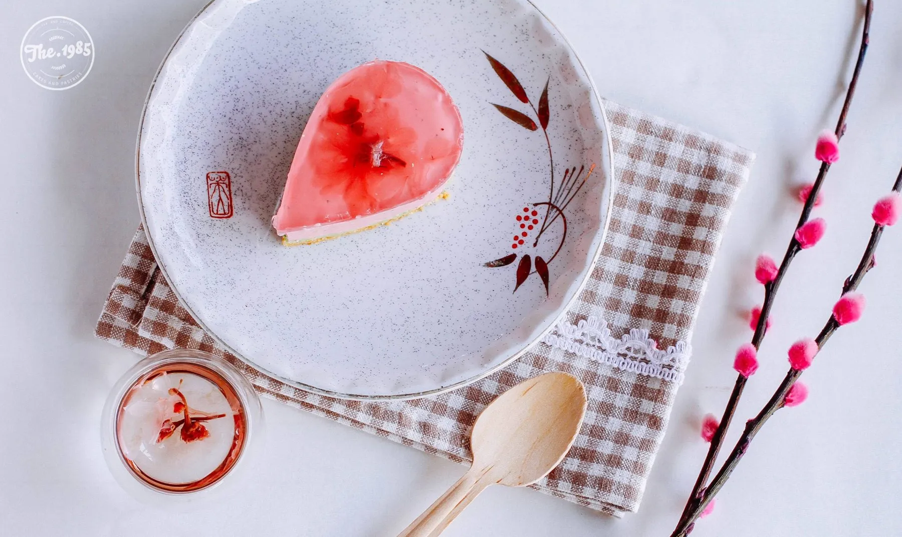 Sakura jelly cake on a speckled plate